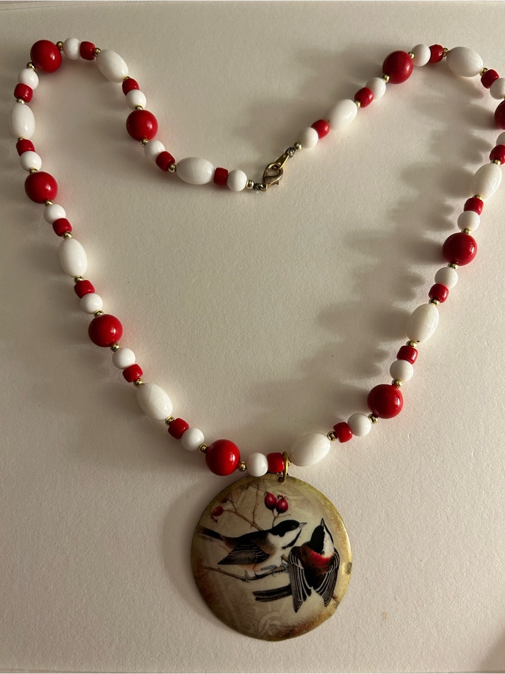 Vintage necklace Finches & red Berries on brass disc on red & white crystal beaf